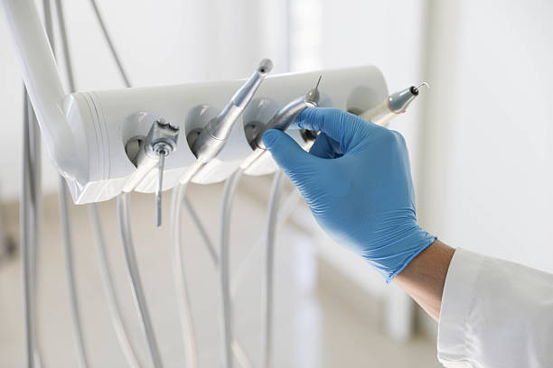 Professional Emergency Dentist technician working in Council Bluffs, IA